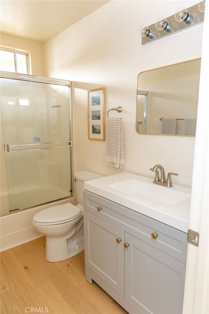 6059 Merion Court Banning, CA 92220 - Photo 33 of 48 a bathroom with a sink a toilet and shower