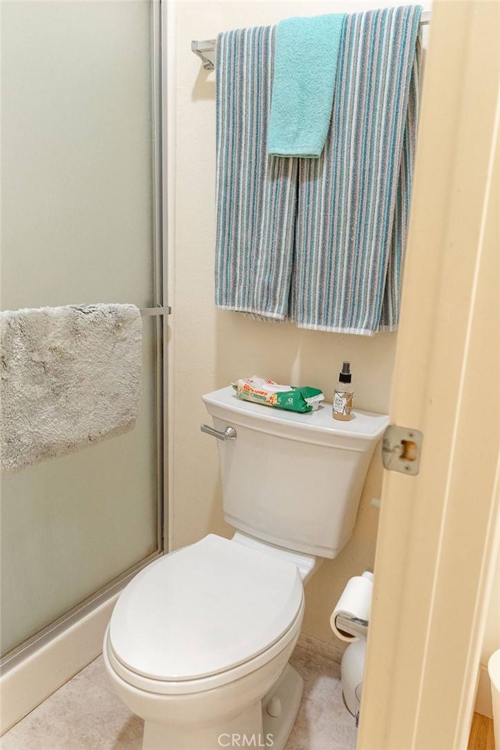 6059 Merion Court Banning, CA 92220 - Photo 37 of 48 a bathroom with a toilet and a sink