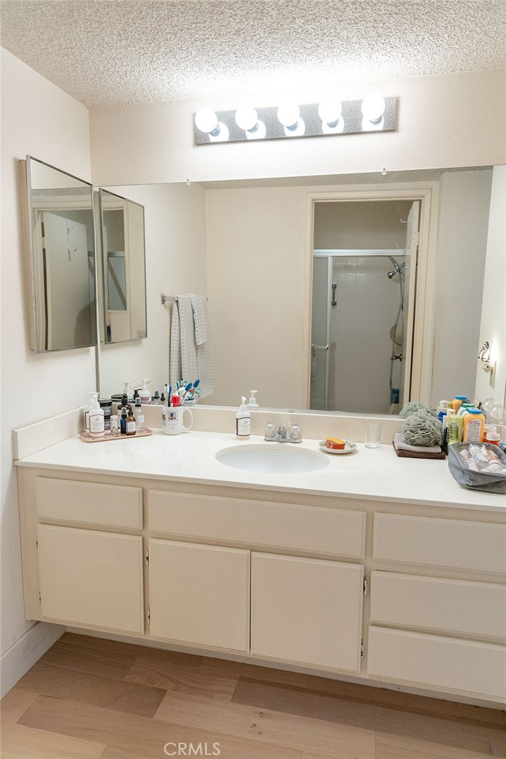 6059 Merion Court Banning, CA 92220 - Photo 39 of 48 a bathroom with a sink and a mirror