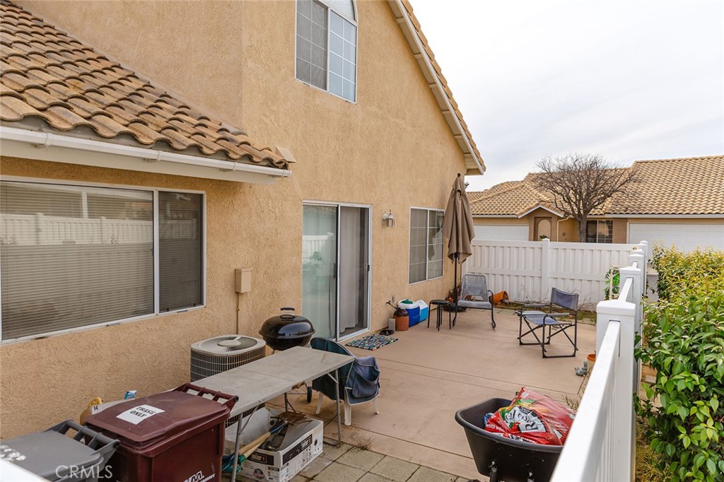6059 Merion Court Banning, CA 92220 - Photo 45 of 48 a backyard of a house with outdoor seating