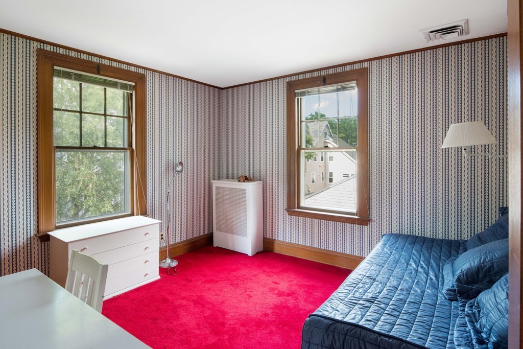 61 Ballard Street Newton, MA 02459 - Photo 17 of 22 a bedroom with a bed and a window