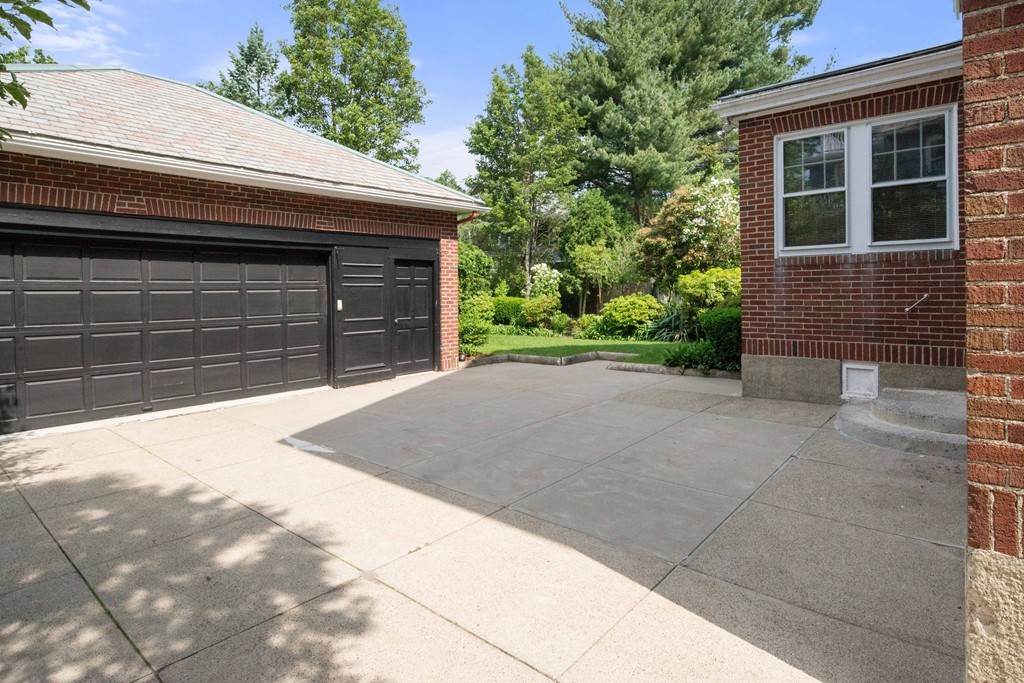 61 Ballard Street Newton, MA 02459 - Photo 20 of 22 a front view of a house with a yard