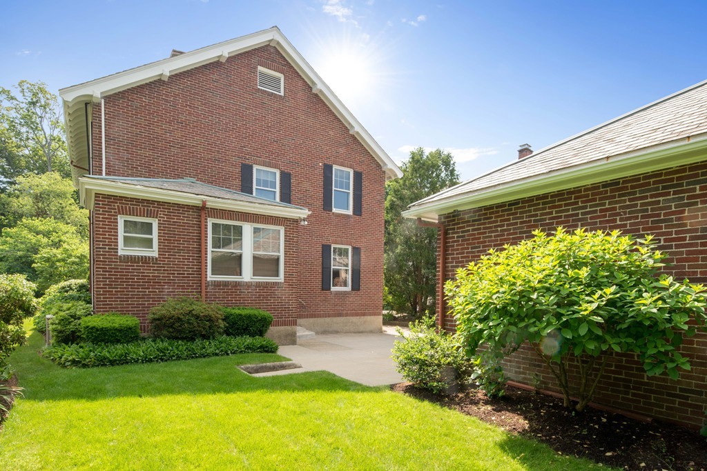 61 Ballard Street Newton, MA 02459 - Photo 22 of 22 a front view of a house with a yard