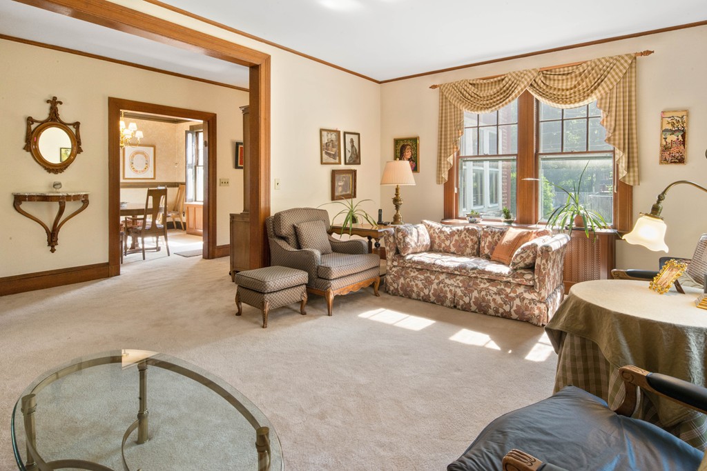 61 Ballard Street Newton, MA 02459 - Photo 4 of 22 a living room with furniture and a window