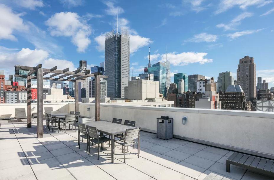 350 West 37th Street, Unit 16C Manhattan, NY 10018 - Photo 8 of 9 a view of city from terrace