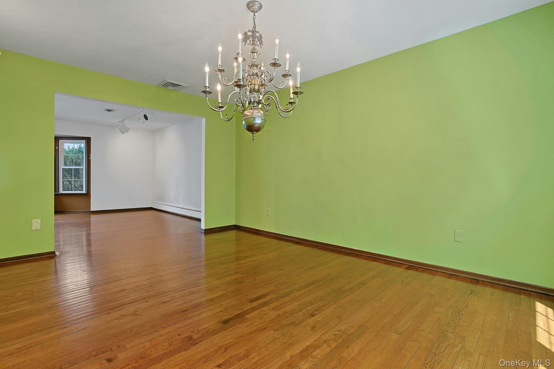 44 Ruth Drive New City, NY 10956 - Photo 7 of 40 Large dining room looks towards the living room