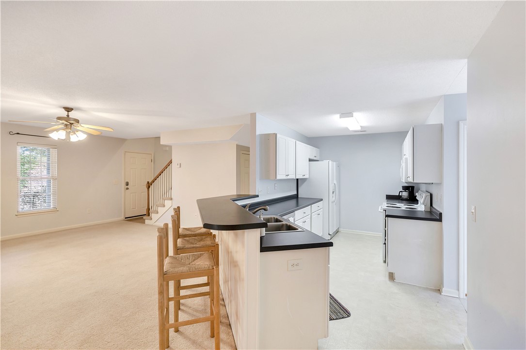 256 Rock Creek Road Clemson, SC 29631 - Photo 11 of 30 This bright and open layout features a functional kitchen and inviting living space.