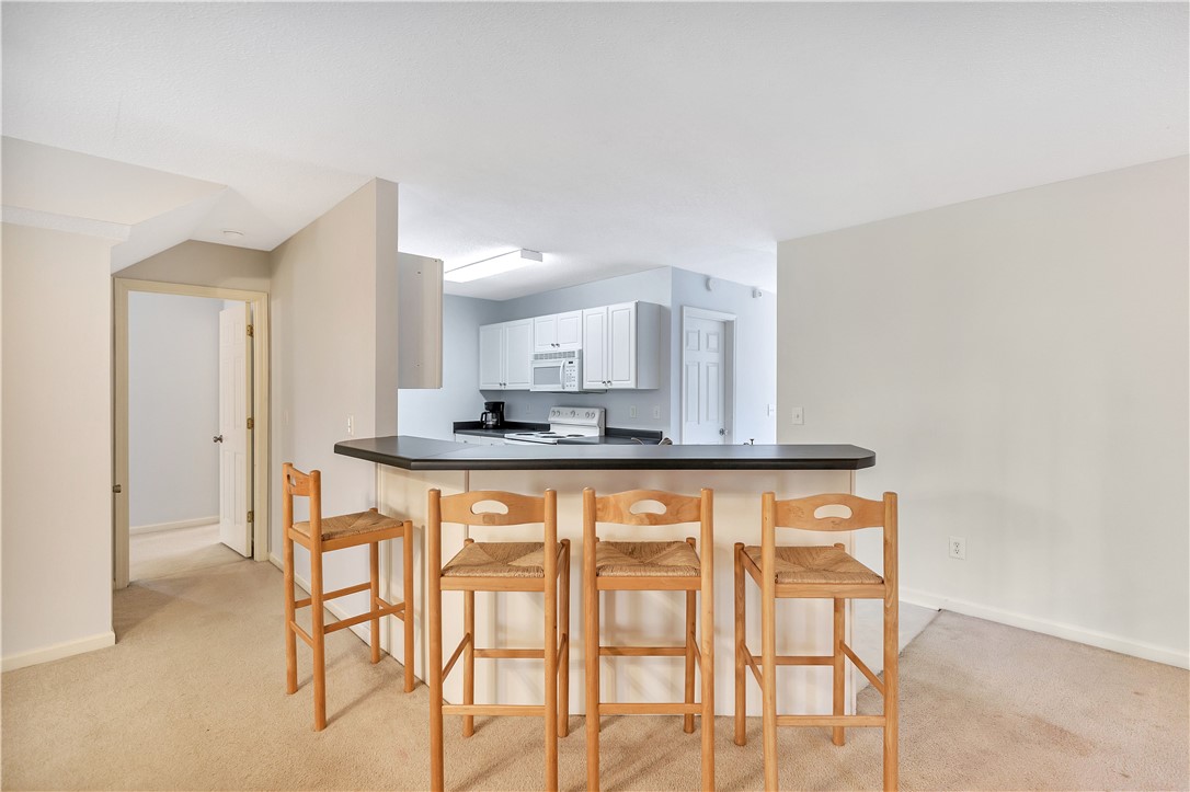 256 Rock Creek Road Clemson, SC 29631 - Photo 12 of 30 A functional kitchen island, perfect for casual dining or entertaining guests.