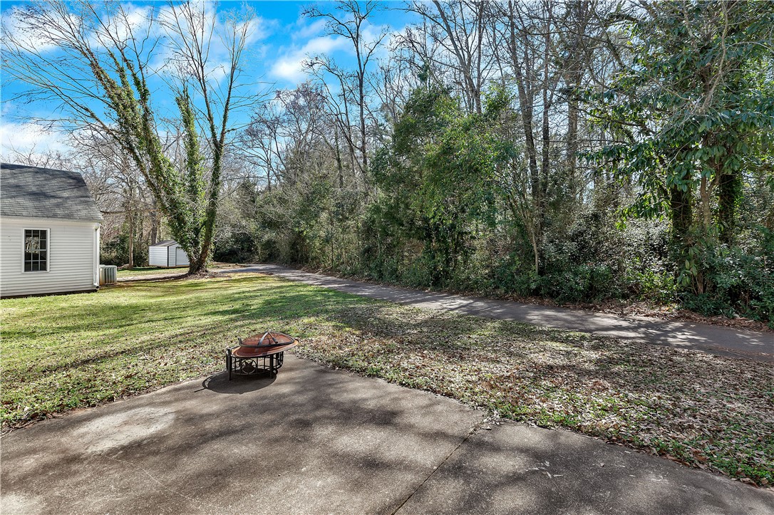256 Rock Creek Road Clemson, SC 29631 - Photo 25 of 30 This tranquil outdoor space offers a peaceful escape with ample natural surroundings.