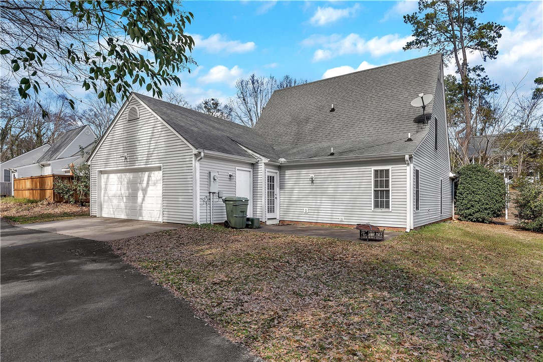 256 Rock Creek Road Clemson, SC 29631 - Photo 29 of 30 This charming home features a practical attached garage and a private yard, perfect for outdoor living.