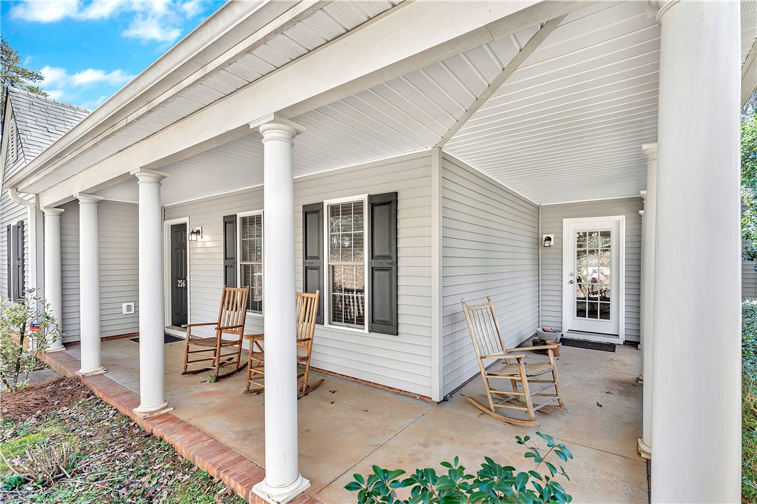 256 Rock Creek Road Clemson, SC 29631 - Photo 4 of 30 This inviting covered porch provides a welcoming entry with ample space for relaxation.