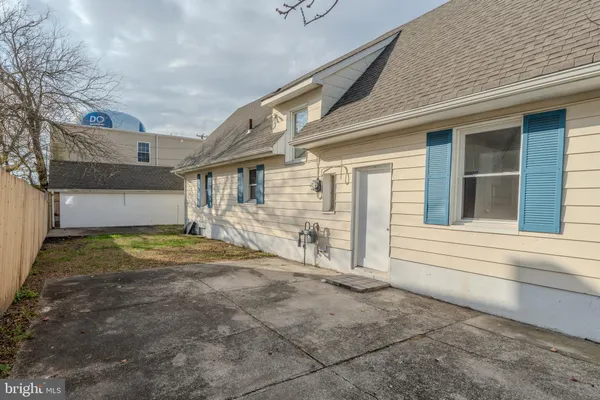 a car parked in front of a house