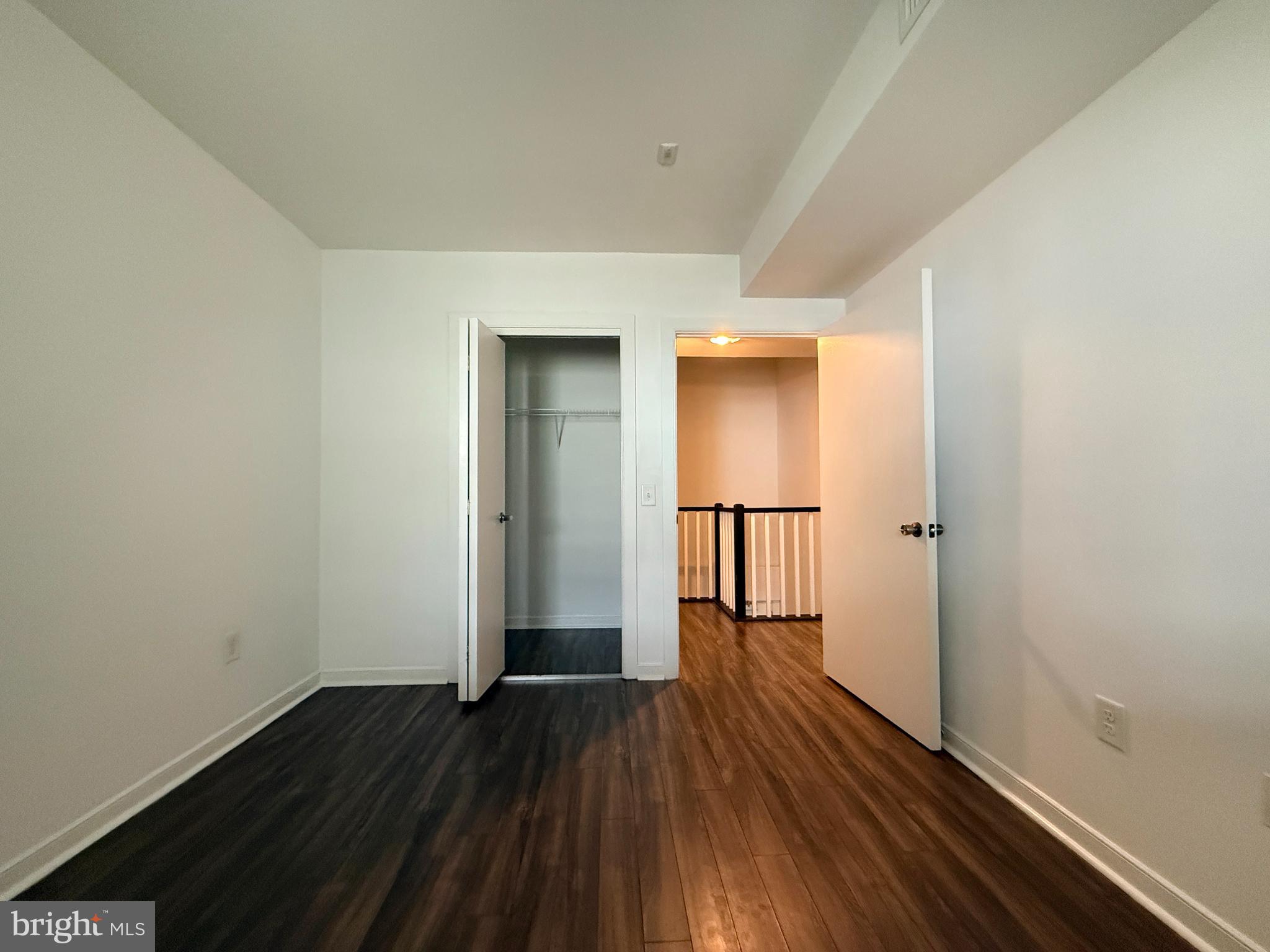 1250 9th Street Northwest, Unit 214 Washington, DC 20001 - Photo 17 of 27 wooden floor in an empty room
