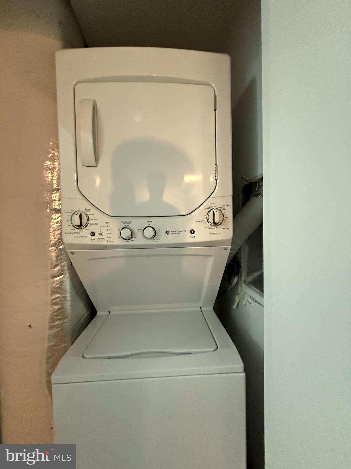 1250 9th Street Northwest, Unit 214 Washington, DC 20001 - Photo 21 of 27 a utility room with dryer and washer