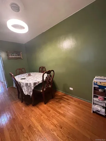 a bedroom with a bed and a table