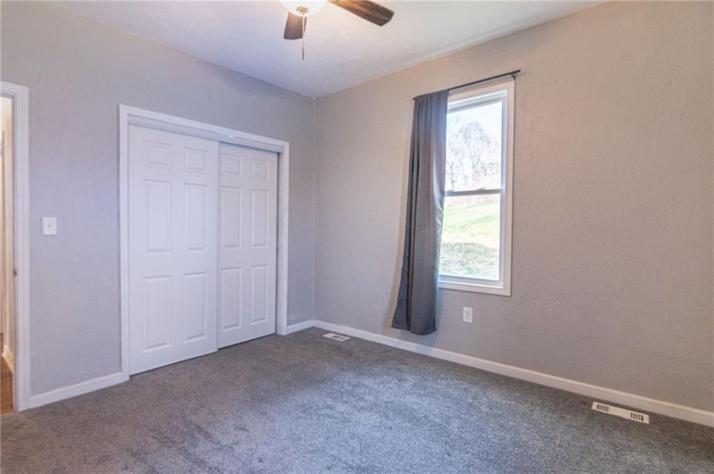 2541 Clay Pike Irwin, PA 15642 - Photo 18 of 36 an empty room with windows and closet