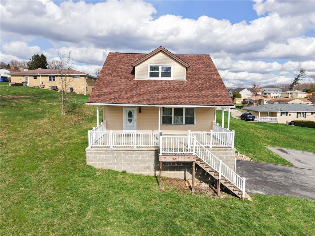 2541 Clay Pike Irwin, PA 15642 - Photo 2 of 36 a front view of a house with a yard