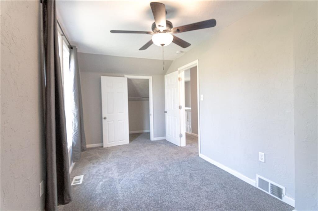 2541 Clay Pike Irwin, PA 15642 - Photo 21 of 36 a view of an empty room with a chandelier fan