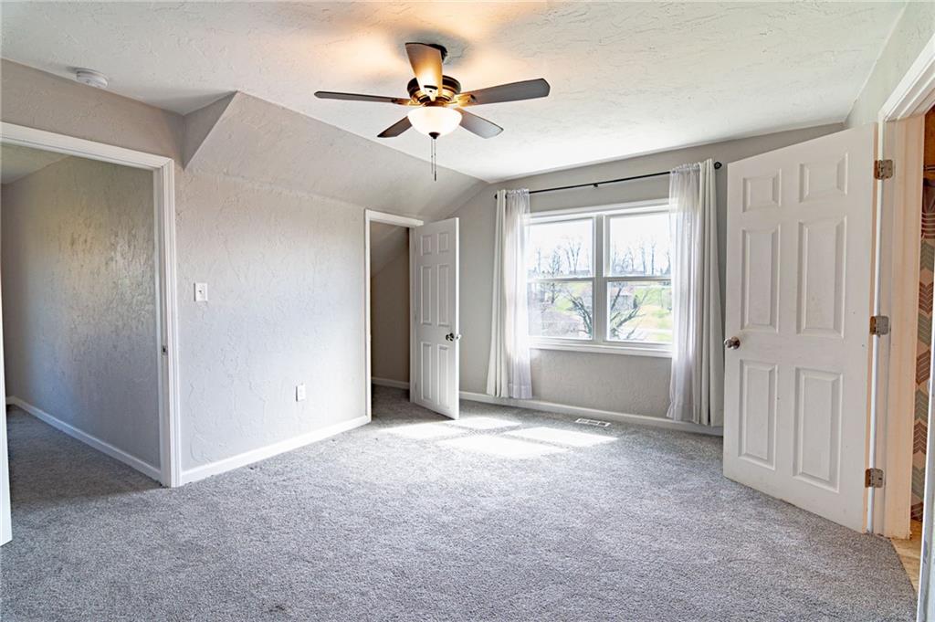 2541 Clay Pike Irwin, PA 15642 - Photo 26 of 36 a view of a livingroom with a ceiling fan and window