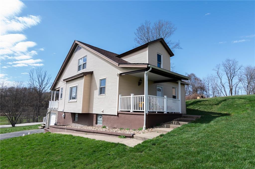 2541 Clay Pike Irwin, PA 15642 - Photo 31 of 36 a house view with a garden space