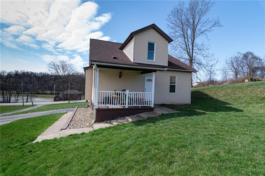2541 Clay Pike Irwin, PA 15642 - Photo 32 of 36 a front view of a house with garden