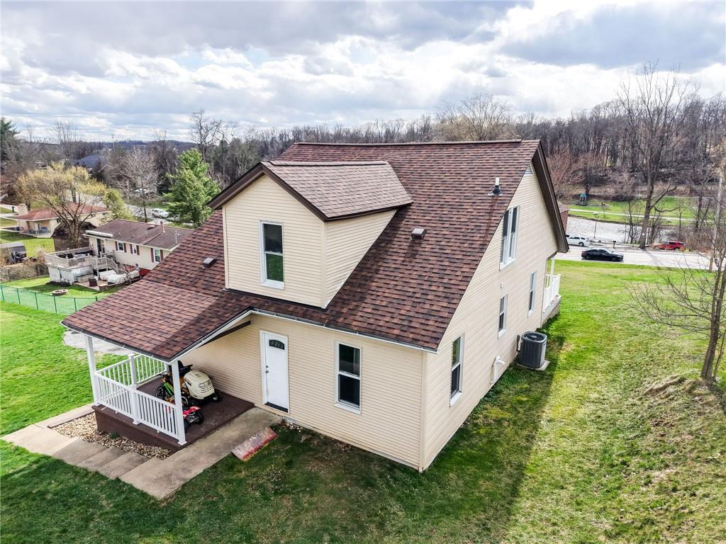 2541 Clay Pike Irwin, PA 15642 - Photo 33 of 36 a aerial view of a house in a big yard with large trees