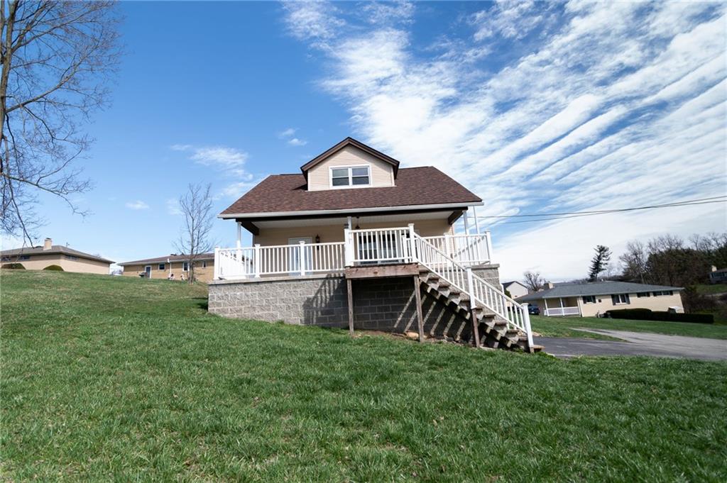 2541 Clay Pike Irwin, PA 15642 - Photo 36 of 36 a front view of a house with a yard