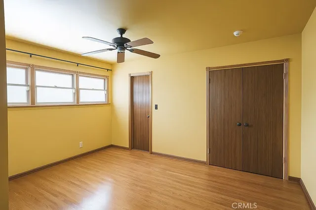 a backyard of a house with yard and outdoor seating