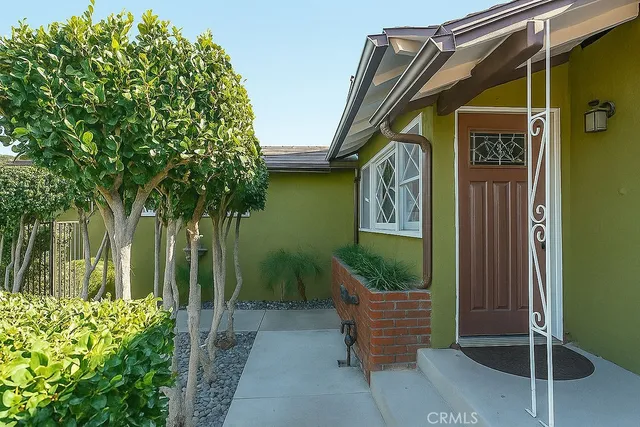 a view of a house with a garden