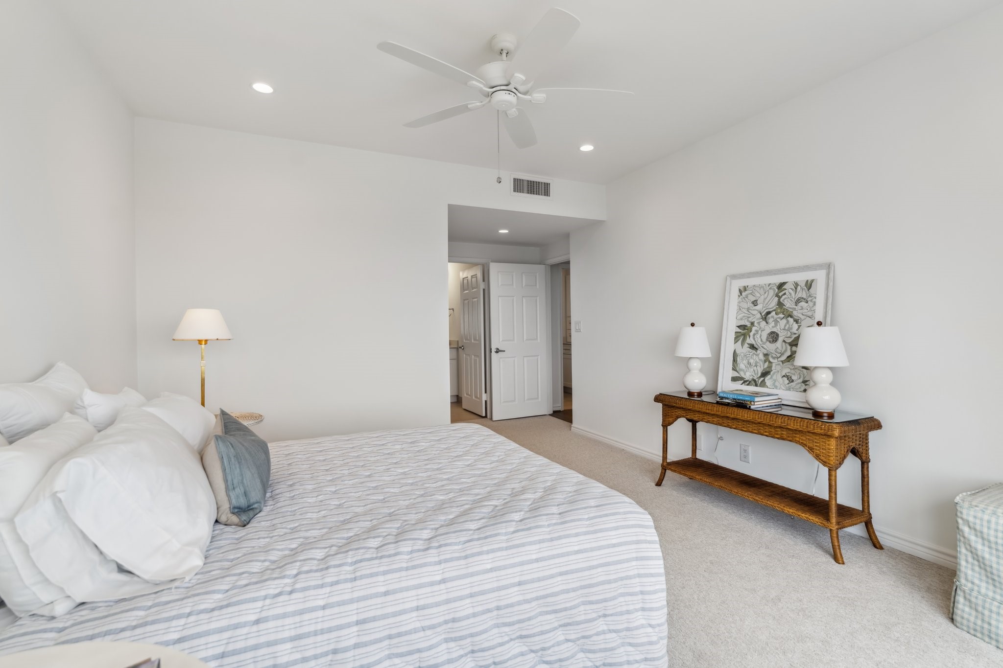 2001 Holcombe Boulevard, Unit 2305 Houston, TX 77030 - Photo 11 of 46 a bedroom with a bed and a chandelier
