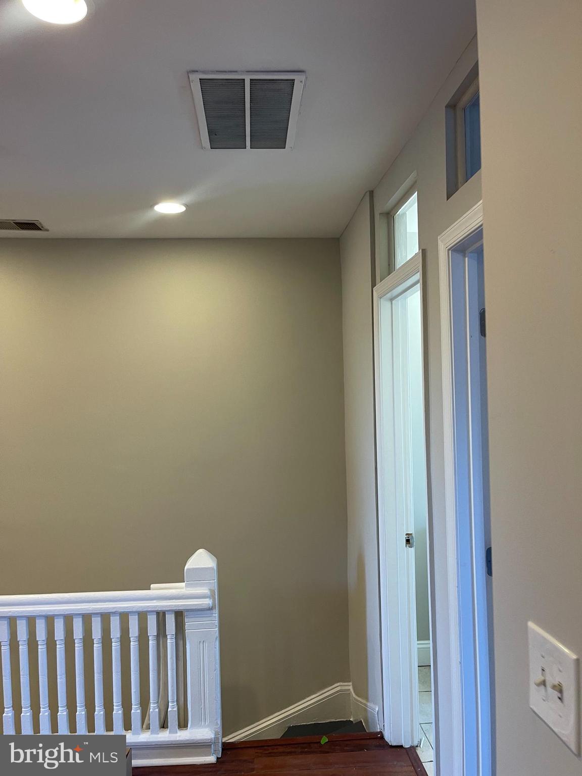 543 Florida Avenue Northwest, Unit 4 Washington, DC 20001 - Photo 4 of 7 a view of a livingroom with wooden floor and a window