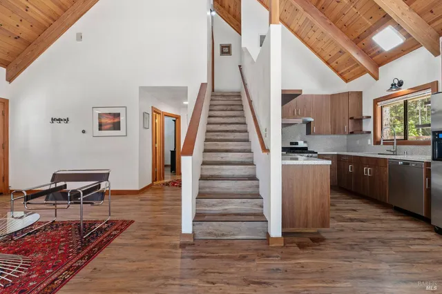 a view of kitchen and wooden floor
