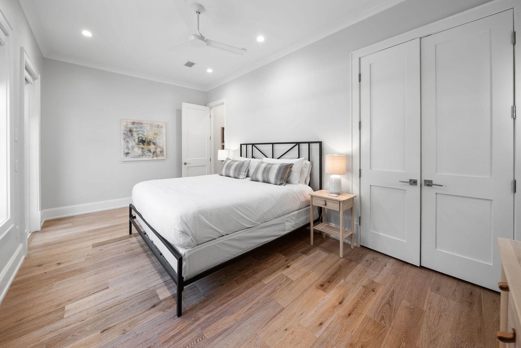 8183 East County Highway 30A Inlet Beach, FL 32461 - Photo 15 of 63 a bedroom with a bed and a painting on the wall