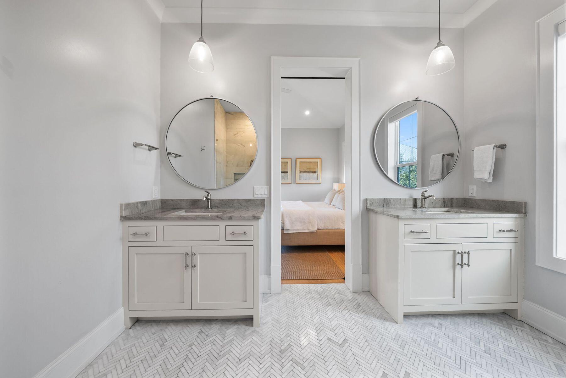 8183 East County Highway 30A Inlet Beach, FL 32461 - Photo 27 of 63 a bathroom with a toilet a sink and a mirror