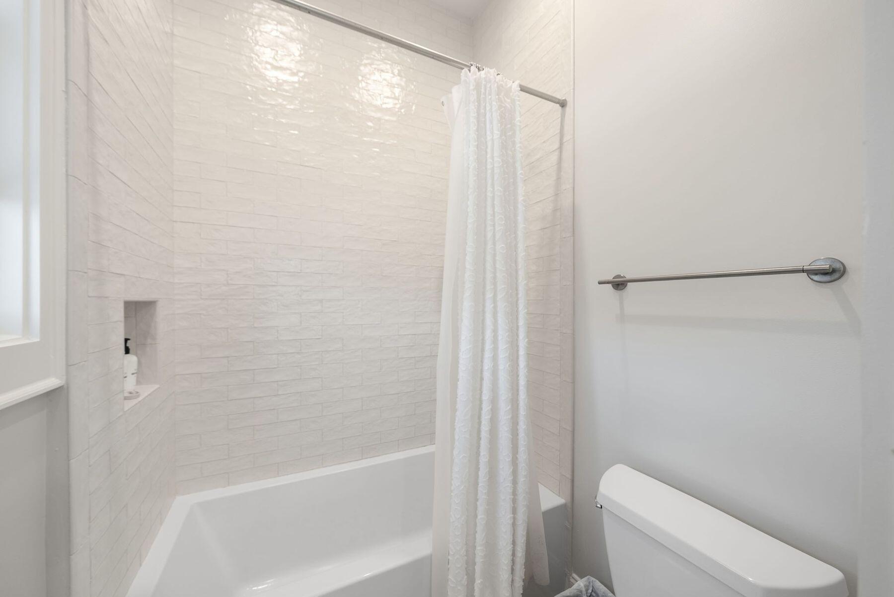 8183 East County Highway 30A Inlet Beach, FL 32461 - Photo 33 of 63 a bathroom with a shower and a toilet