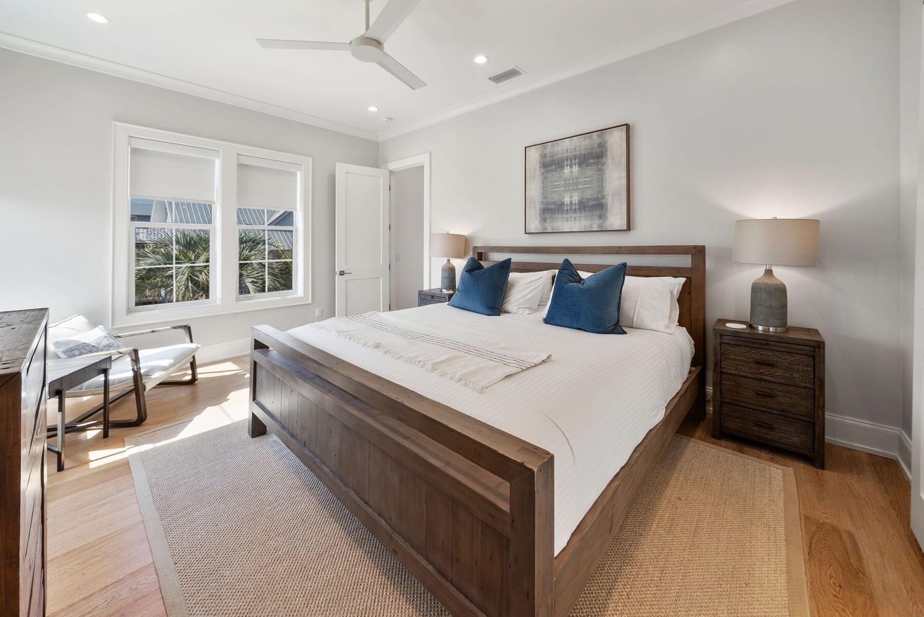 8183 East County Highway 30A Inlet Beach, FL 32461 - Photo 35 of 63 a bedroom with a bed and a large window