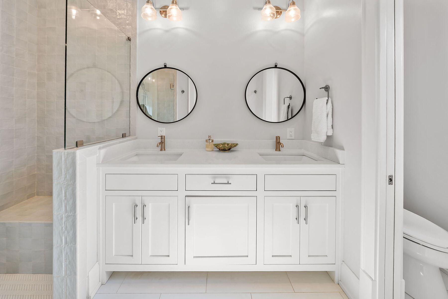 8183 East County Highway 30A Inlet Beach, FL 32461 - Photo 37 of 63 a bathroom with a sink and a mirror