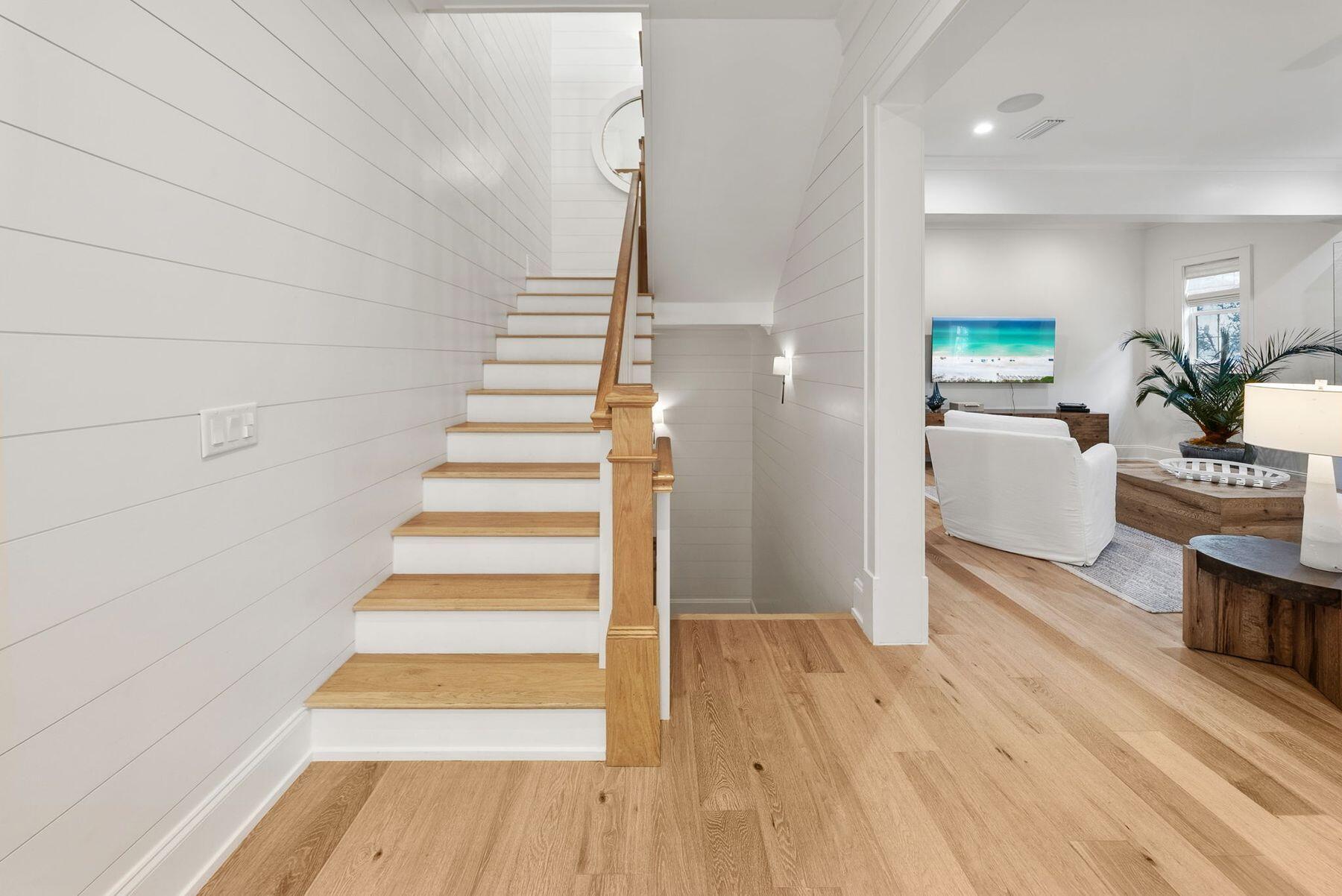 8183 East County Highway 30A Inlet Beach, FL 32461 - Photo 41 of 63 a view of entryway and hall with wooden floor