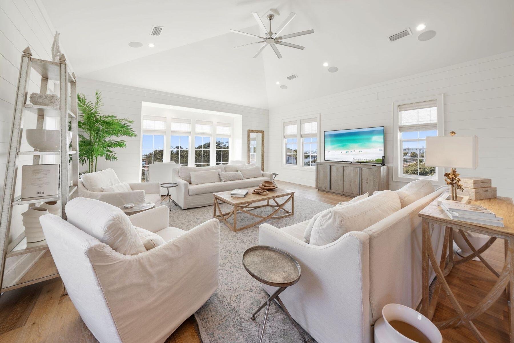 8183 East County Highway 30A Inlet Beach, FL 32461 - Photo 47 of 63 a living room with furniture and a large window