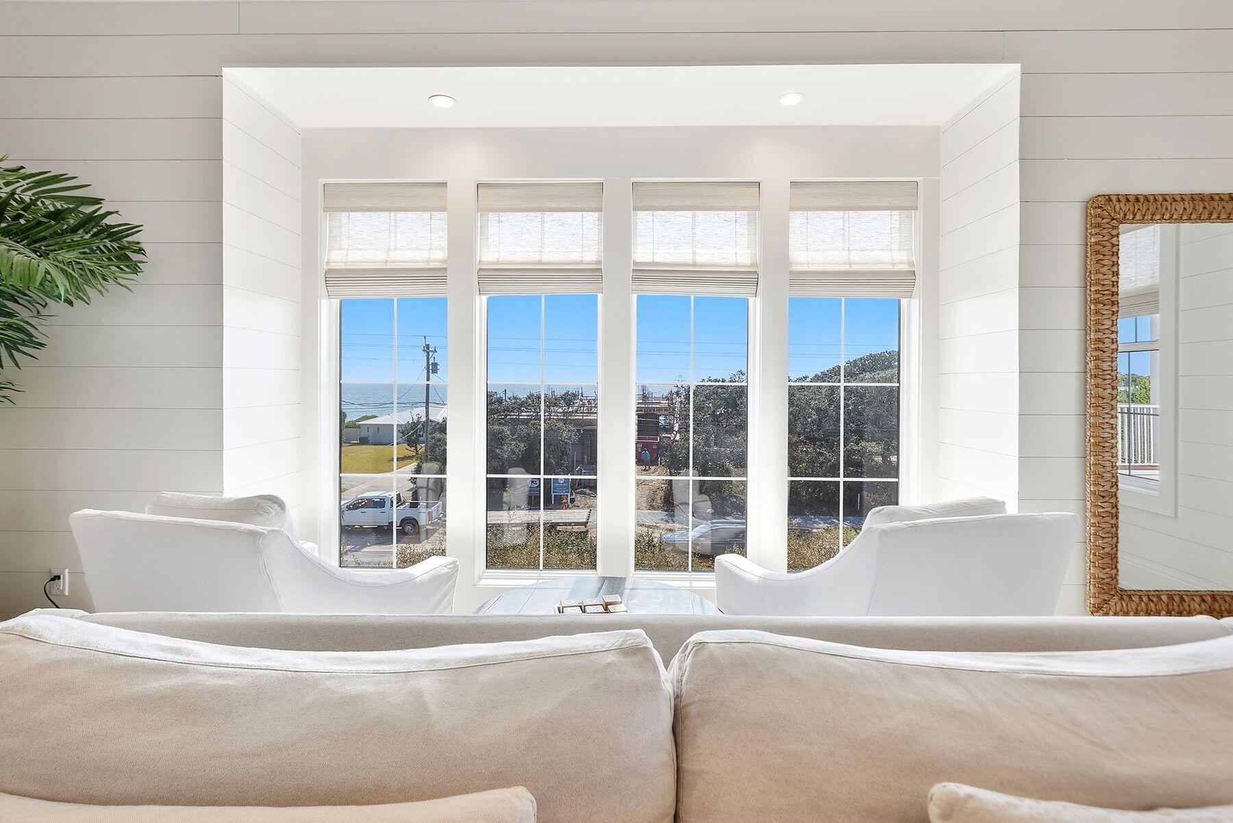 8183 East County Highway 30A Inlet Beach, FL 32461 - Photo 48 of 63 a bed sitting in front of a window