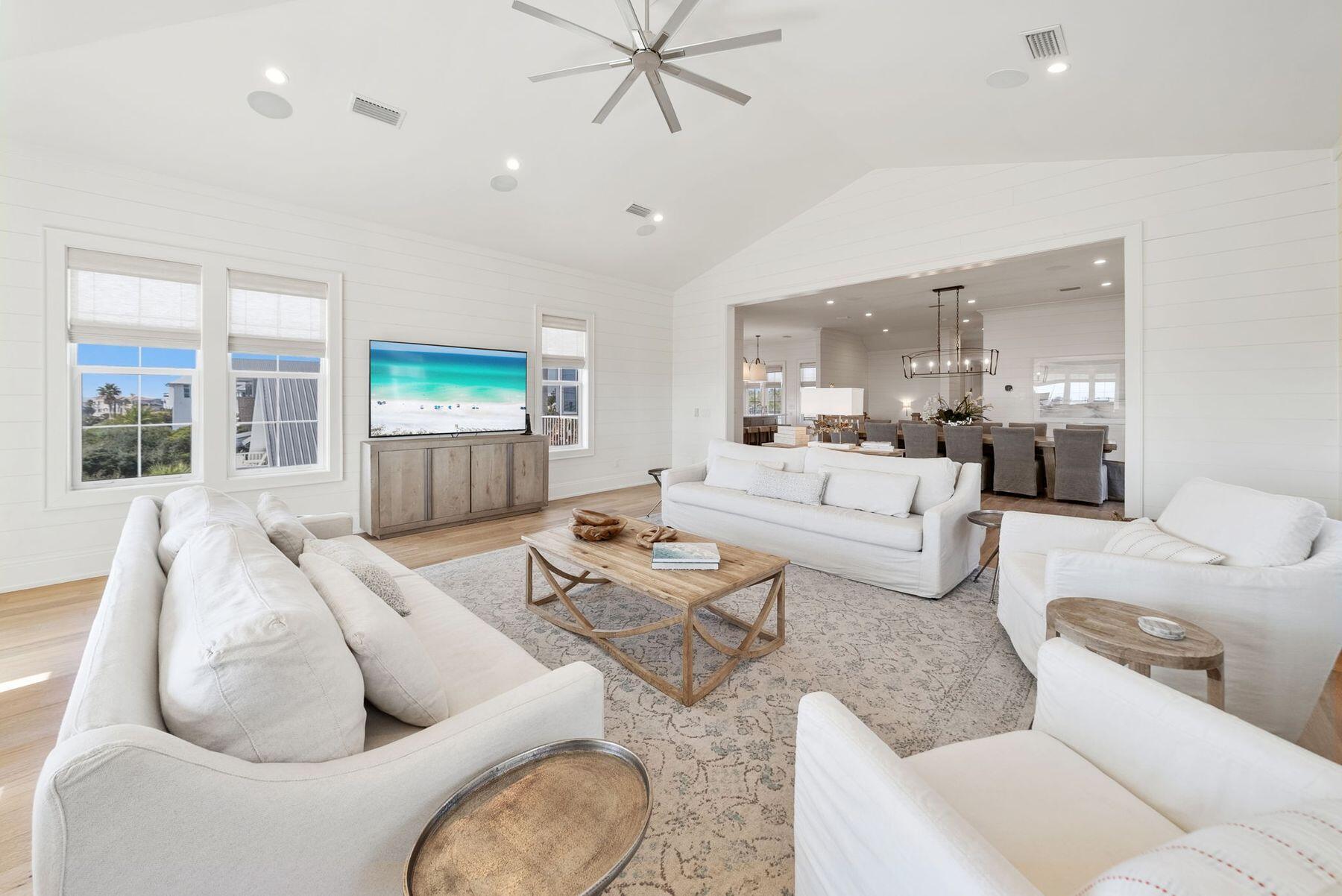8183 East County Highway 30A Inlet Beach, FL 32461 - Photo 49 of 63 a living room with furniture and a large window