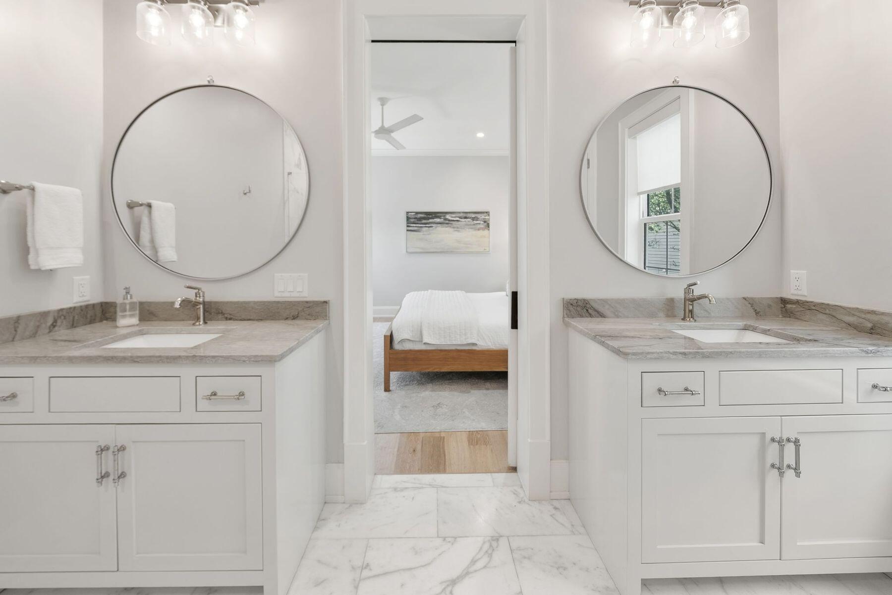 8183 East County Highway 30A Inlet Beach, FL 32461 - Photo 54 of 63 a en suite bathroom with a granite countertop sink and a mirror