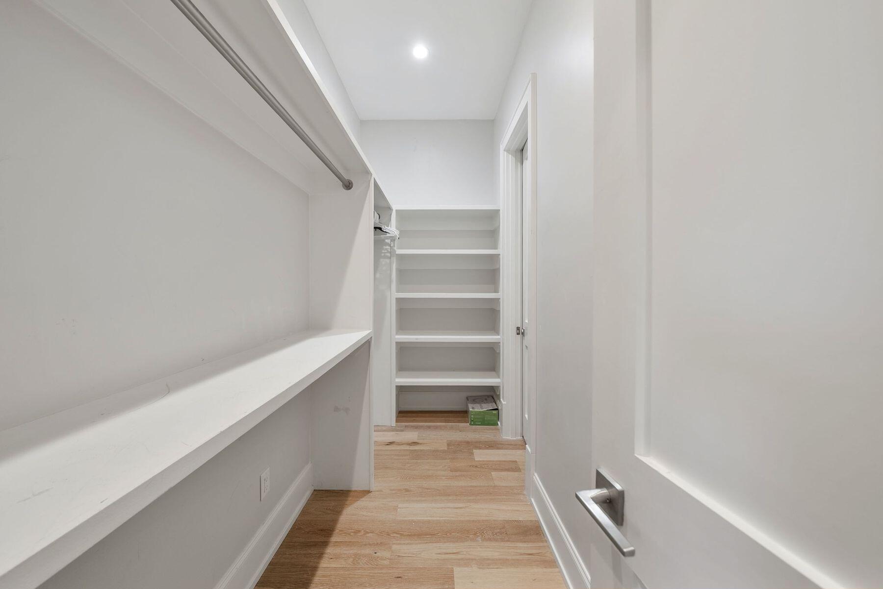 8183 East County Highway 30A Inlet Beach, FL 32461 - Photo 56 of 63 a view of walk in closet with empty racks