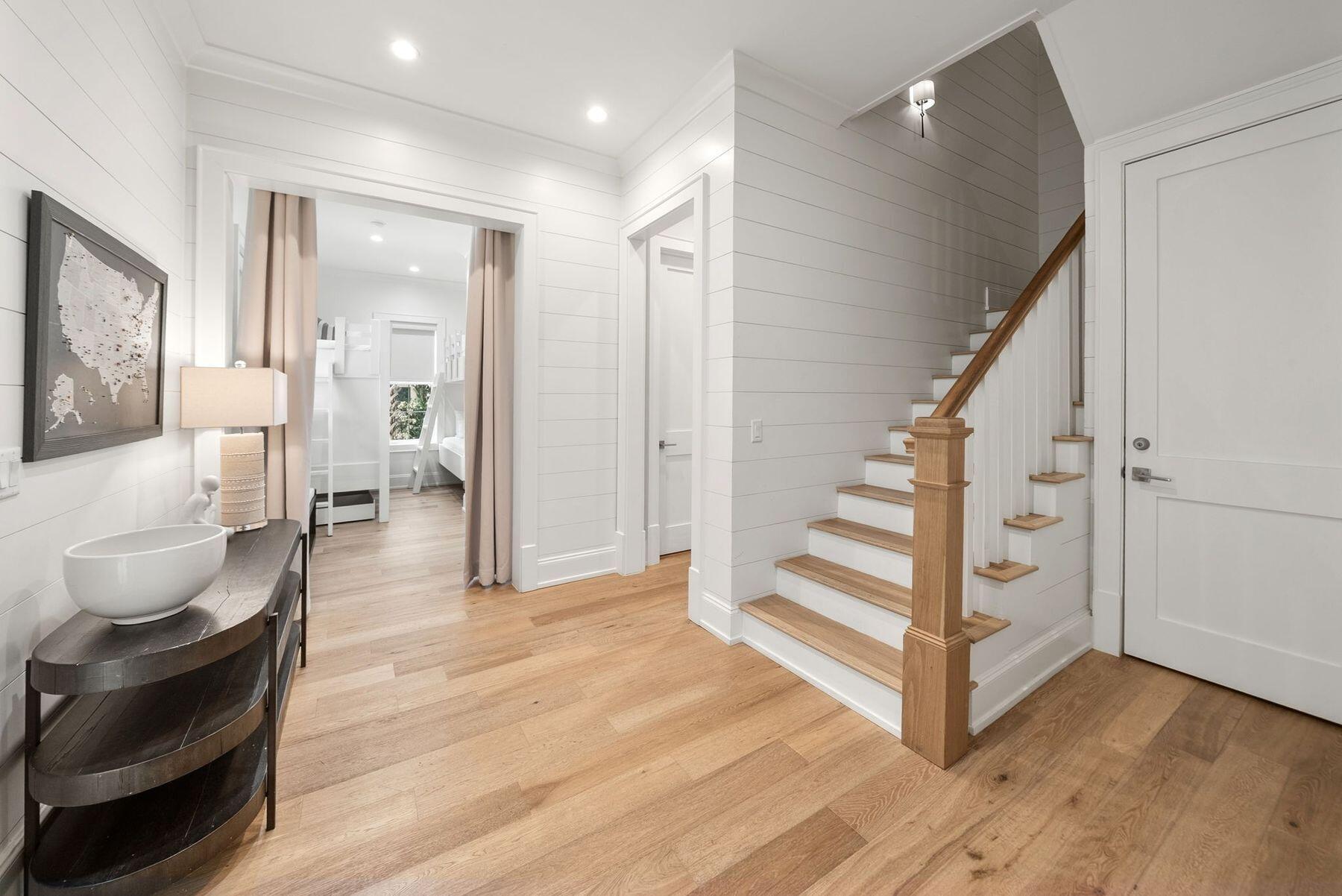 8183 East County Highway 30A Inlet Beach, FL 32461 - Photo 9 of 63 a view of a livingroom with furniture and stairs