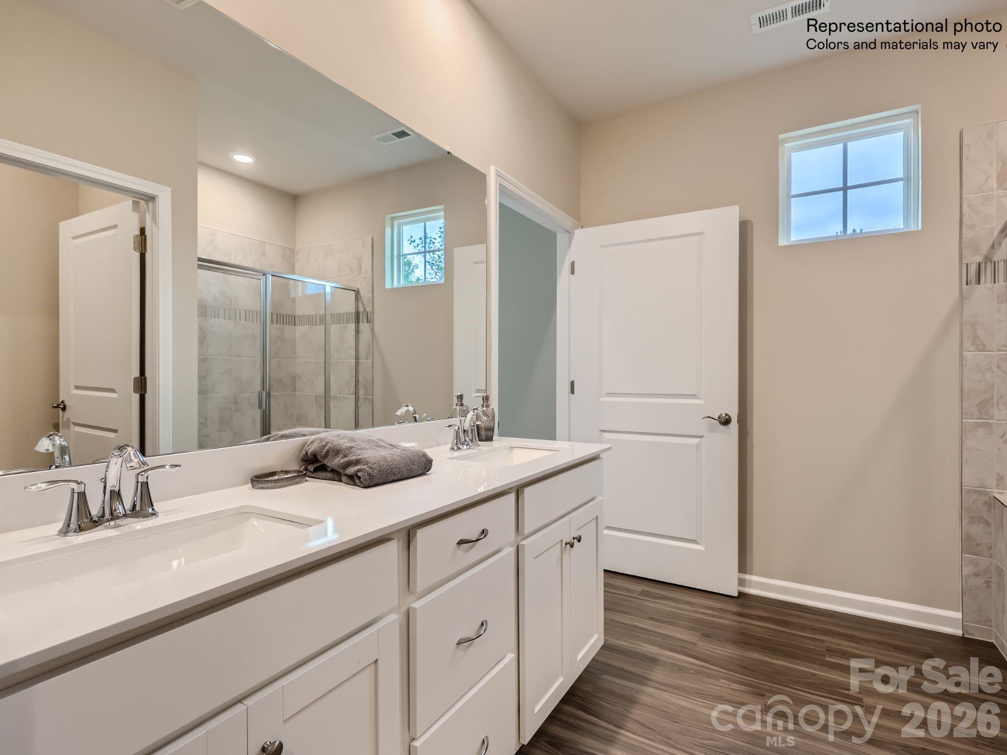 3326 Amarillo Court Lancaster, SC 29720 - Photo 12 of 19 a bathroom with a granite countertop sink mirror and double