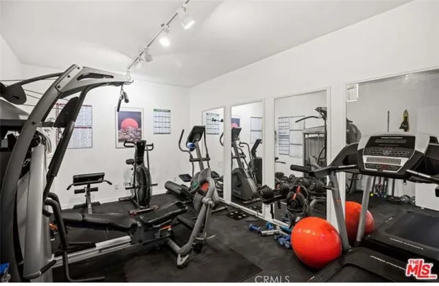 a view of a room with gym equipment