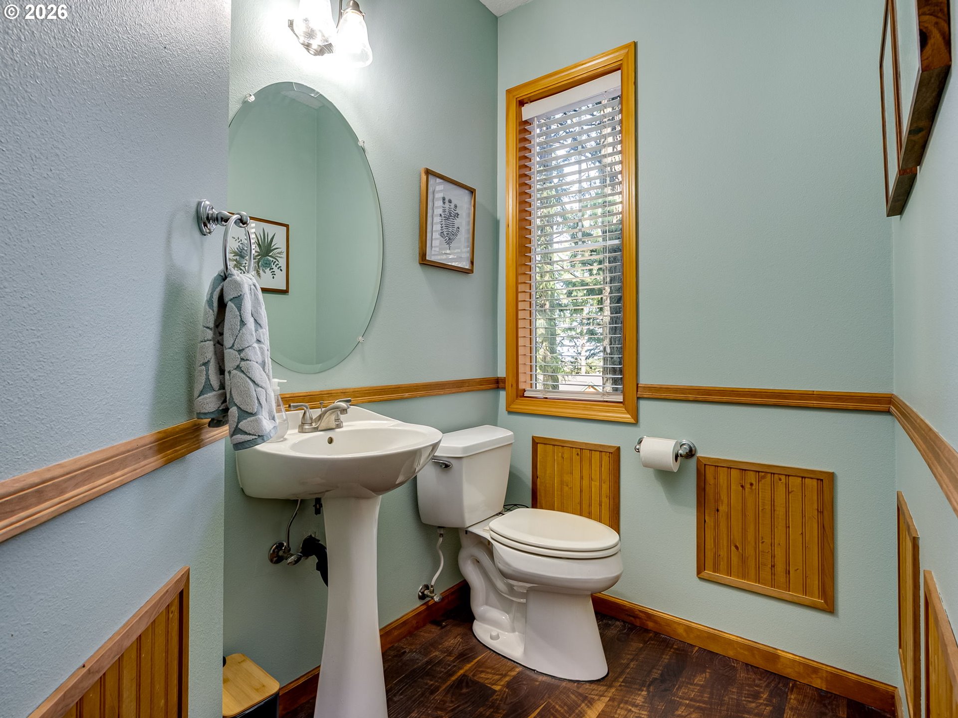 22967 South Day Hill Road Estacada, OR 97023 - Photo 15 of 40 a bathroom with a toilet sink and mirror
