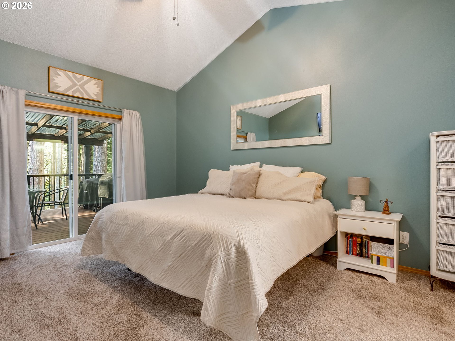 22967 South Day Hill Road Estacada, OR 97023 - Photo 16 of 40 a bedroom with a bed and a window