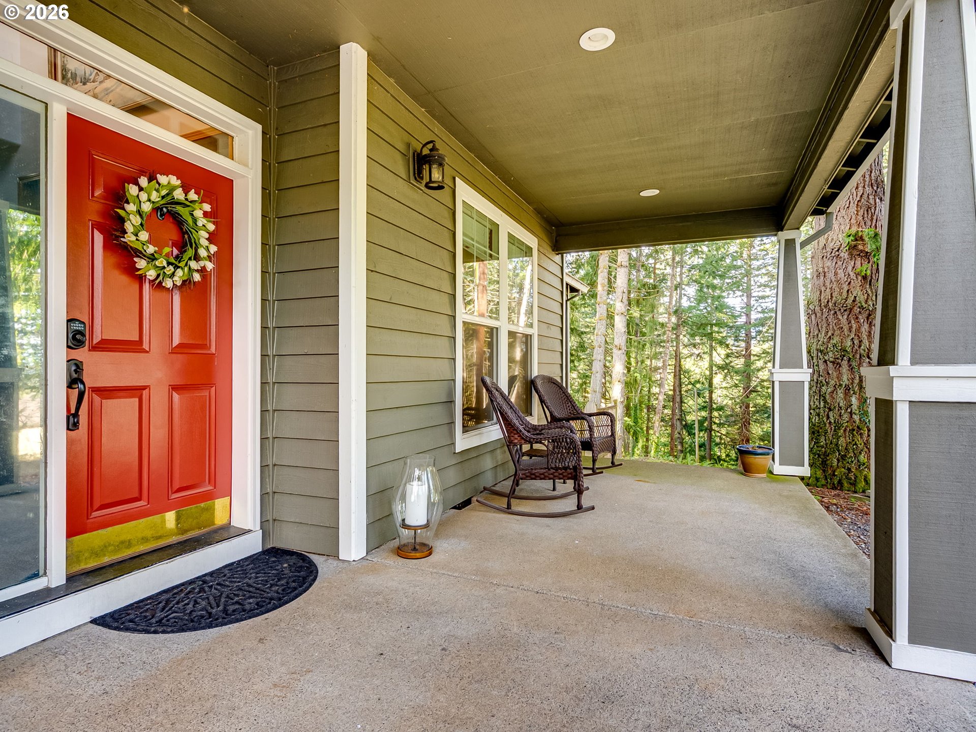 22967 South Day Hill Road Estacada, OR 97023 - Photo 39 of 40 a view of a porch with a table and chairs
