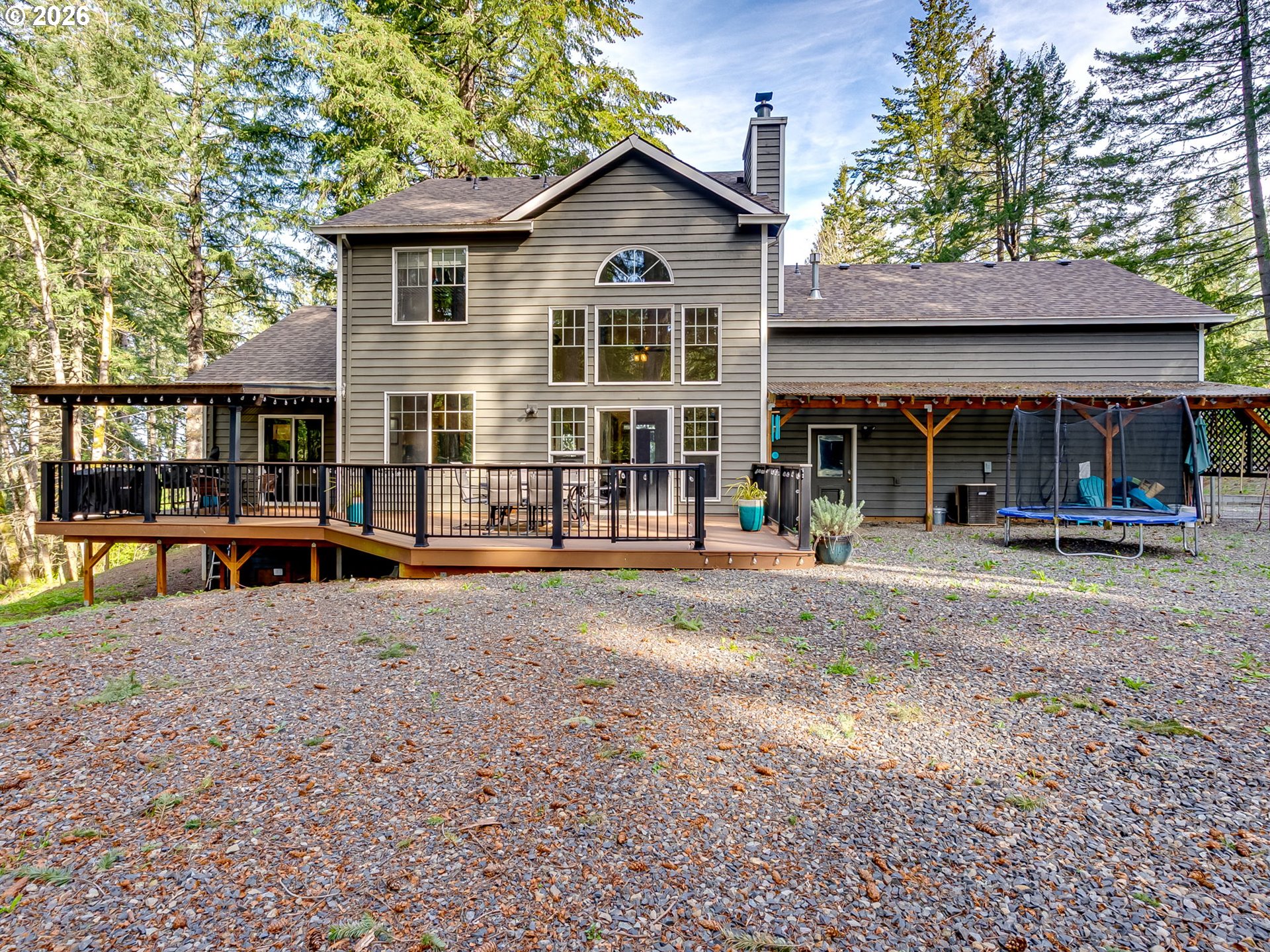 22967 South Day Hill Road Estacada, OR 97023 - Photo 40 of 40 a view of a big house with large trees and plants